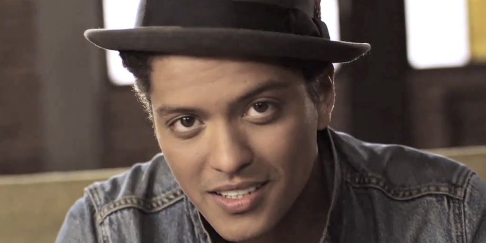 Bruno Mars and Little Mix go head-to-head in the singles race